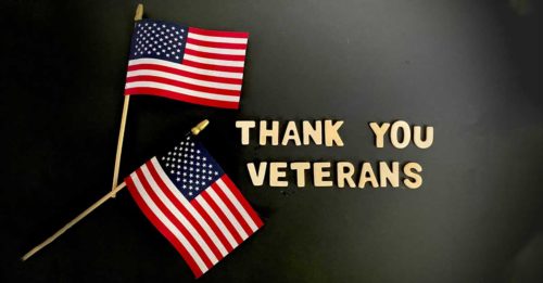 Thank you Veterans - two flags on a black background