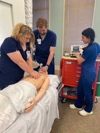 Nurse residency members practicing CPR at Hamilton Medical Center