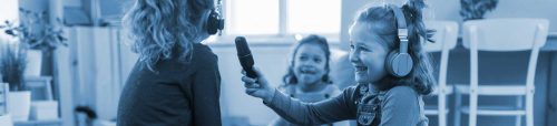 children playing with a microphone