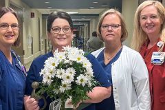 Donna Ivy, RN is a daisy award recipient pictured with nurse leadership